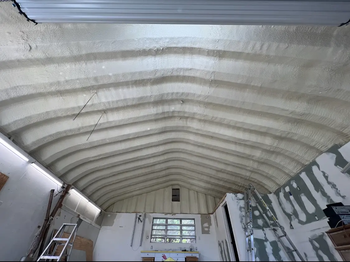 Spray polyurethane foam applied to the underside of a metal roof deck in Santee